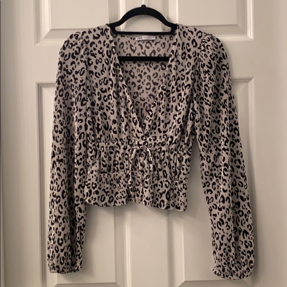 Animal print v-plunge blouse